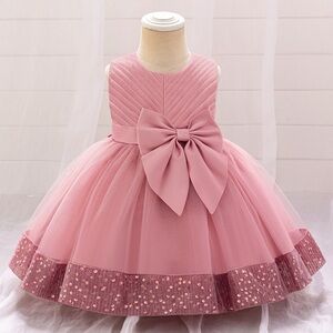 Baby and girl’s formal dress with bow